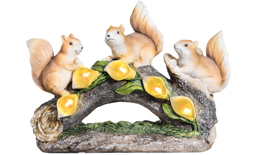 Image 5: One or Two Solar-Powered LED Illuminated Squirrels on Log Decorations