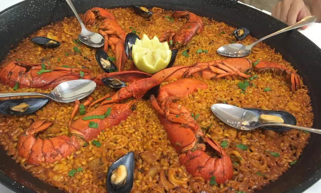 Menú de paella o arroces con paseo en barca opcional en la Albufera