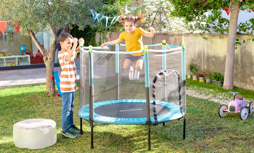 Image 1: Trampoline pour enfant avec enceinte de sécurité de InnovaGoods