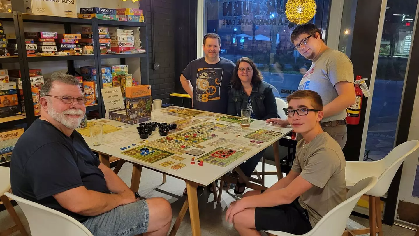 Unlimited Game Play for One, Two, or Four with $10 Food Credit at Your Turn – A Board Game Cafe (Up to 37% Off) - Second Medium