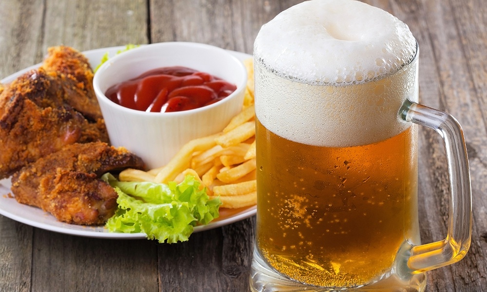 Sip & Savor with $30 or $60 Worth of Food & Drinks at DSTRKT 