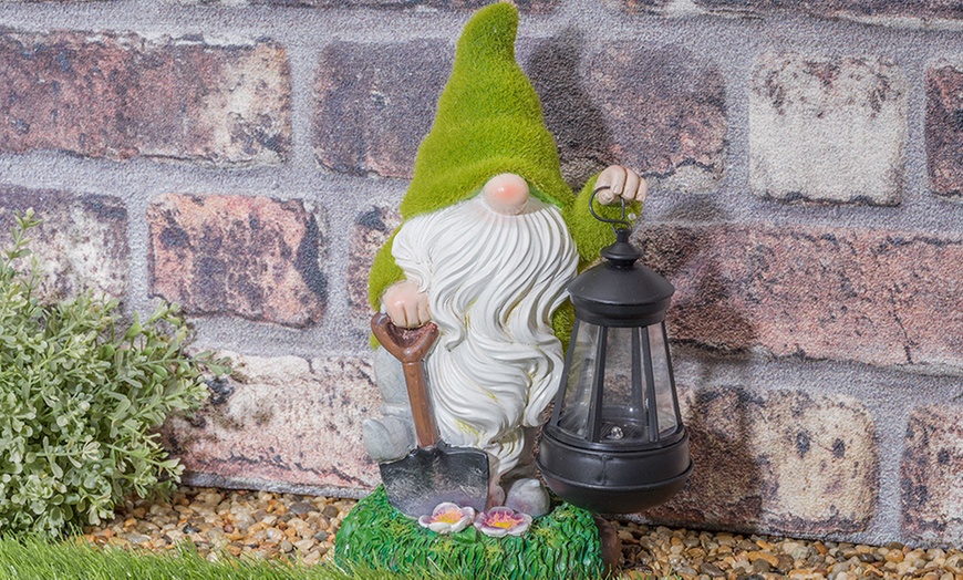 Image 6: One or Two Solar Lantern Flocked Garden Gnomes