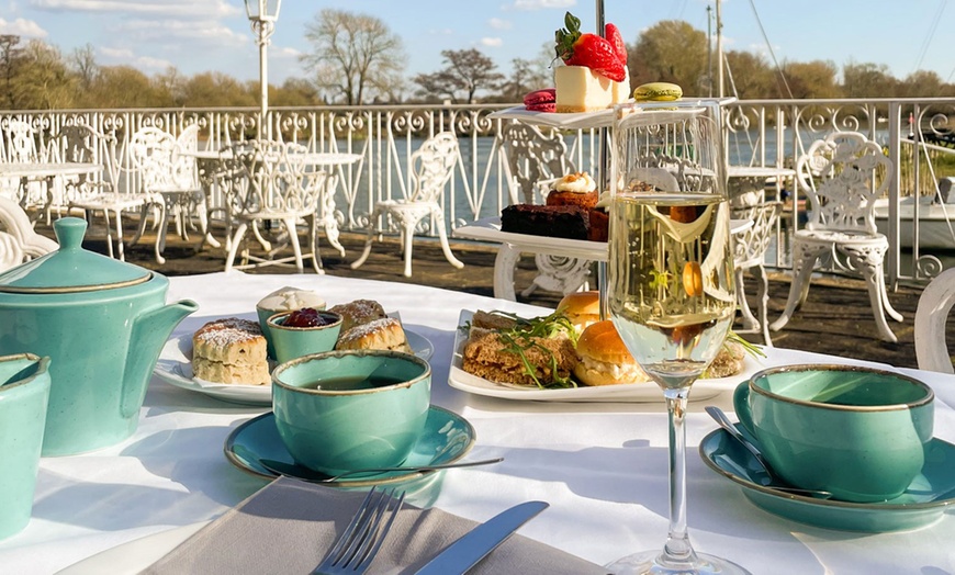 Image 1: Luxury Afternoon Tea/Prosecco with a Riverside View for Two at Warren Lodge Hotel - Up to 36% Off