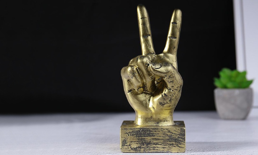 Image 10: Hand Gesture Statue