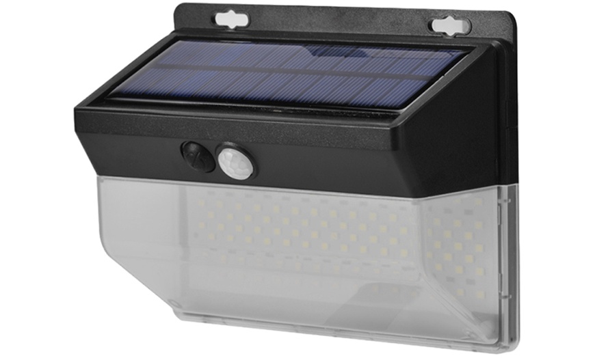 Image 4: Up to Four Packs of 136 LED Solar Motion Sensor Lights