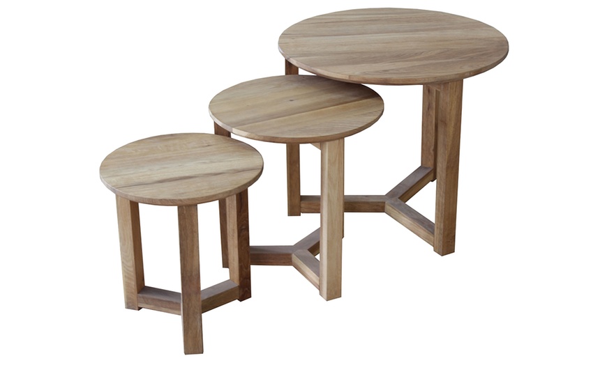 Image 1: Nest of Three Oak Round Tables