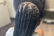 Get Styled: Knotless Braids, Hair Wash, Blow Dry & More(Up to 43% Off) at Livi & co. Beauty Salon - Second Medium