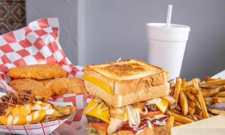 Gourmet Burgers with Fries and Soft Drinks at Mad Mike's Burgers and Fries (Up to 23% Off) - Second Medium
