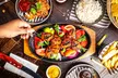 Sizzling Pub & Grill: Tuck In & Turn Up the Heat with delicious Starters & Skillets (Up to 35% Off) - Second Medium