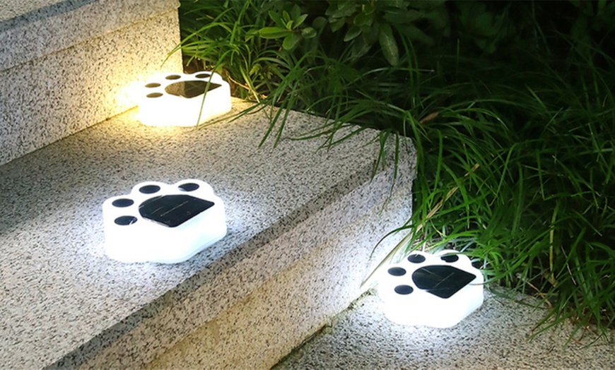 Image 3: Four Piece Solar LED Light Bear Paw Garden Lamp