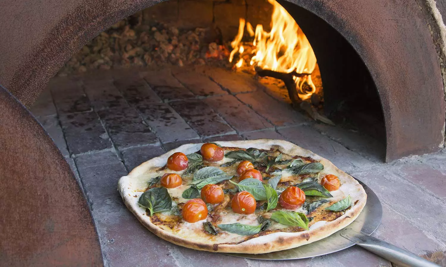 Coal-Fired Pizza, Wings, and More at Ember (Up to 45% Off). Two Options Available. - Primary Image