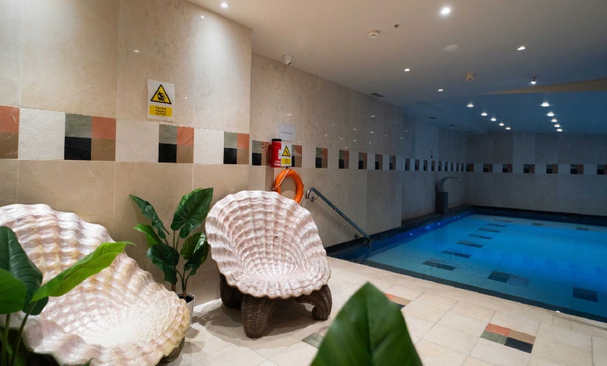 Image 2: 1, 2, or 3 Treatments, 1-Hour Spa Access, & Glass of Bubbly for 1 or 2