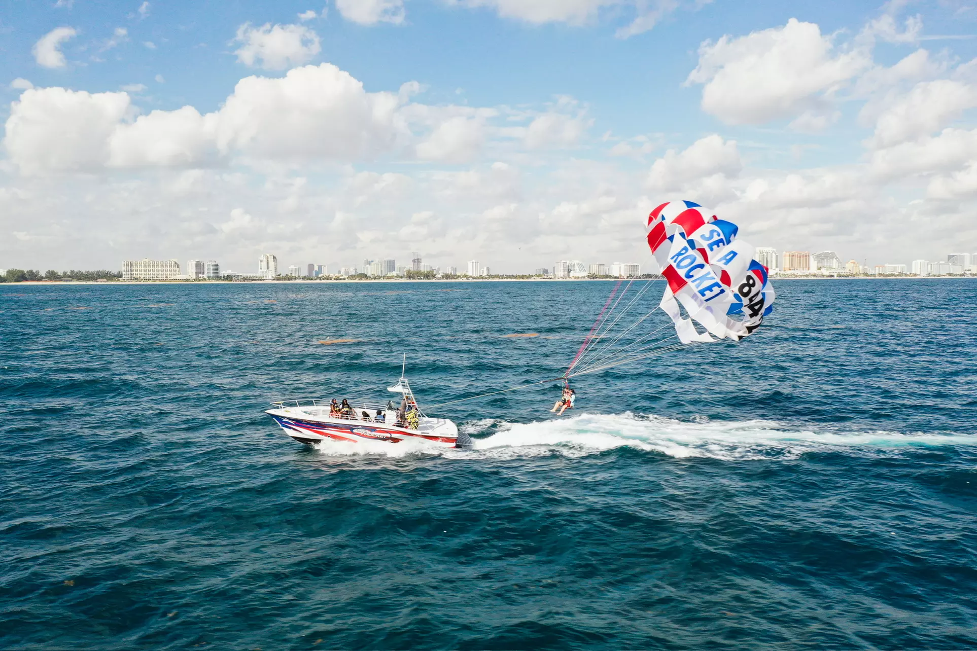Enjoy a 10-12-Min Parasailing Experience with Sea Rocket Adventures!