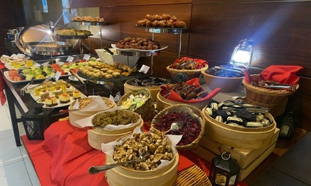 For One Child: 4* Iftar Buffet with Free-Flowing Ramadan Beverages - Together & Co. at 4* Hilton Garden Inn Al Mina