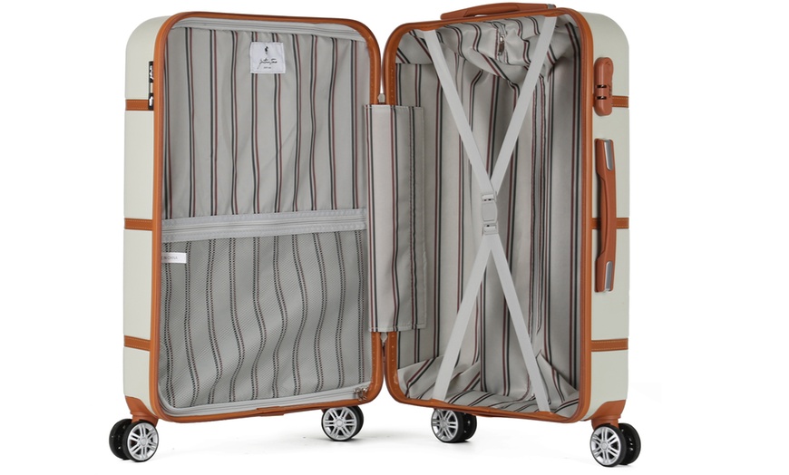 Image 26: Four Trolley Suitcases Set