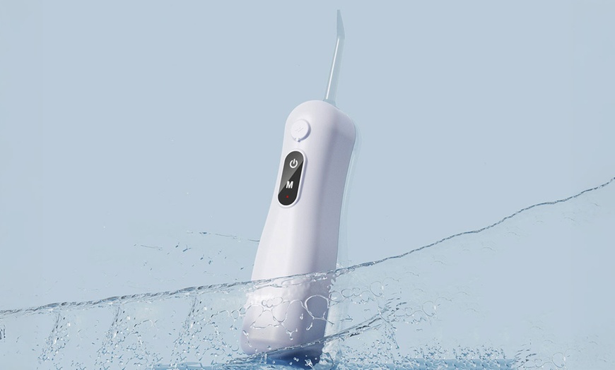 Image 2: Cordless Water Dental Flosser