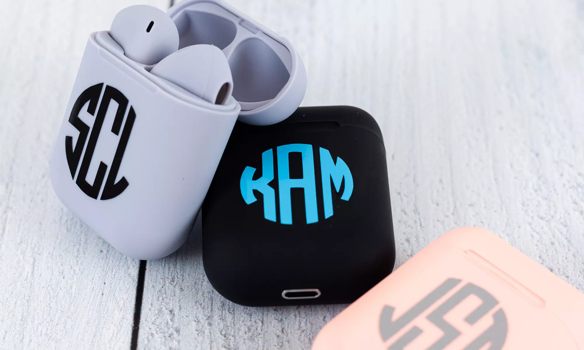 One or Two Sets of Bluetooth Wireless Earbuds with Monogrammed Charging Station from VioletFox (Up to 50% Off) - Primary Image