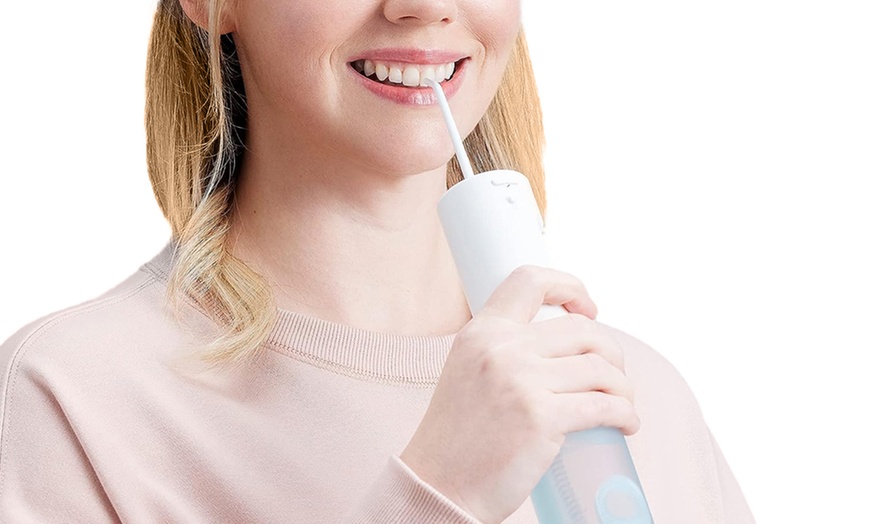 Image 1: Panasonic Portable Oral Irrigator