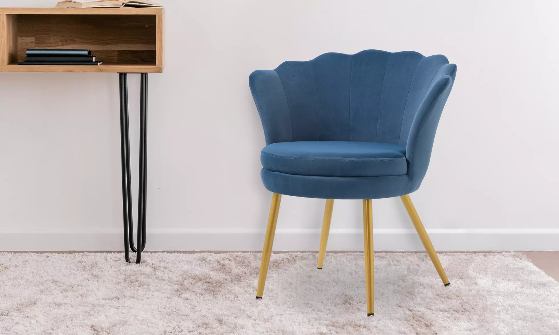 Poltrona in velluto a conchiglia