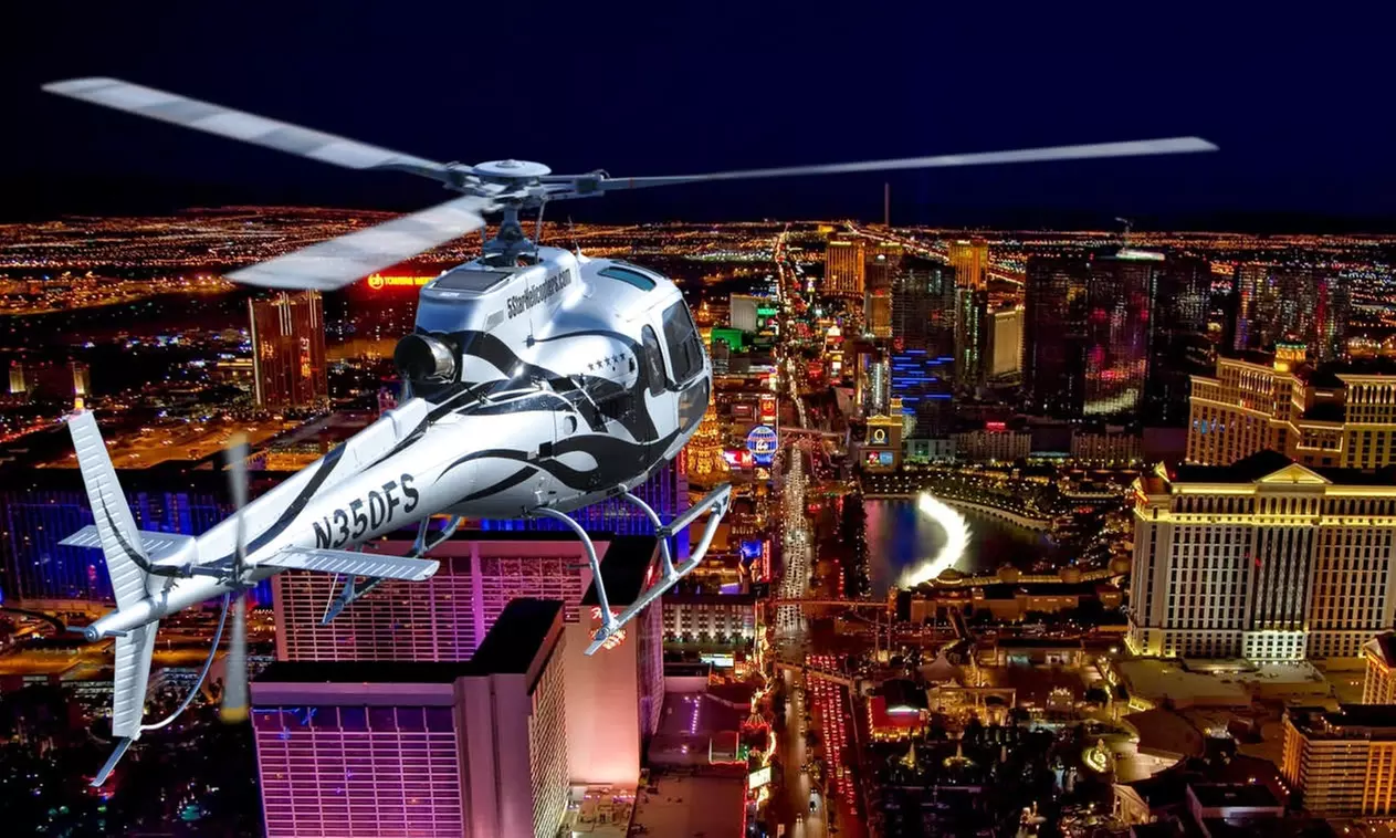 30-Min Las Vegas  Grand Canyon: Ride for 1-4 Guests by Las Vegas Helicopter Tours ( Up to 36% Off) - Primary Image