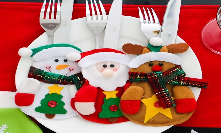 Image 7: Upto 12 Packs of Snowman Xmas Cutlery Holders