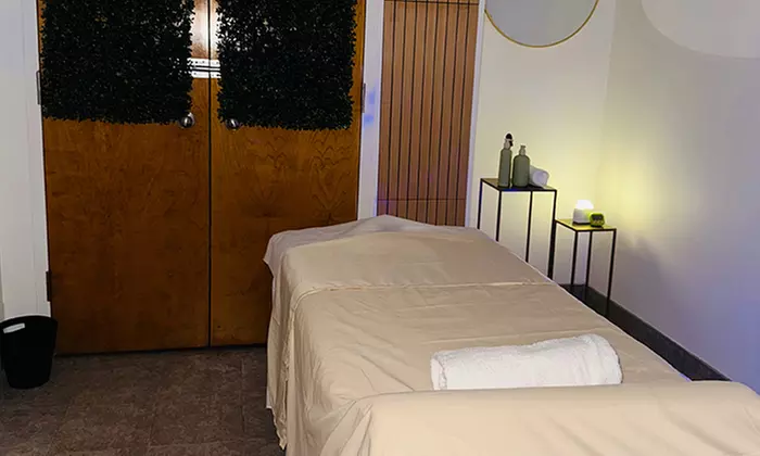 Unwind with a One 60 or 90-Minute Women's Massage with Hot Stones and Aromatherapy ( Up to 51% Off ) - Second Medium