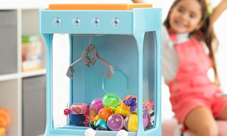 Giocattolo arcade gru ad artigli, con caramelle e peluche da catturare