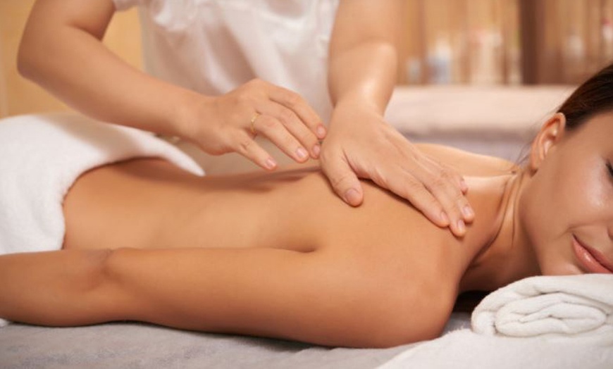 Image 1: Relax with a 30 or 60 Minute Holistic Deep Tissue Massage