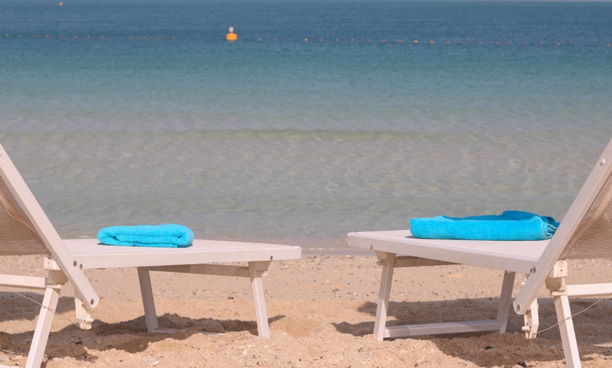 Image 2: Umbrella, Lounger or Towel Hire