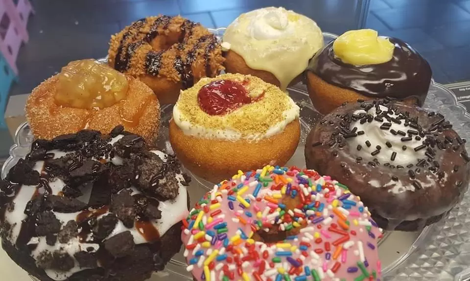 Two Dozen Donuts or Four Vouchers, Each Worth $5 Towards Food at Amazing Glazed (Up to 41% Off) - Primary Image
