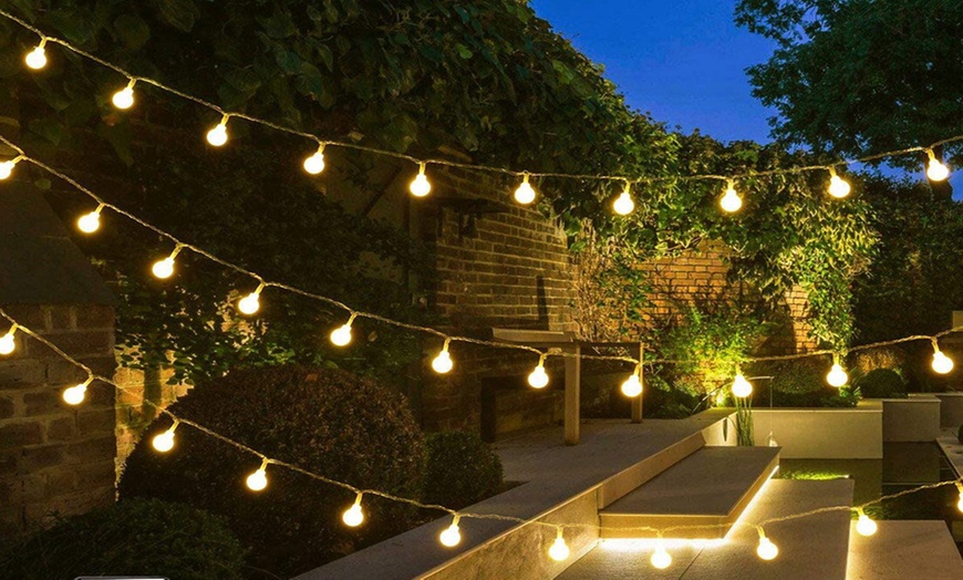 Image 2: Pack di 20 o 40 luci LED da giardino