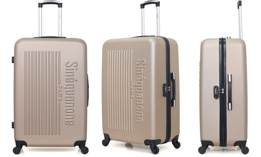 Image 24: Set of Three Suitcases