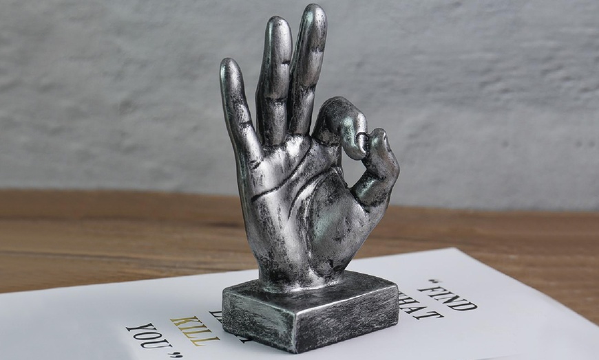 Image 6: Hand Gesture Statue