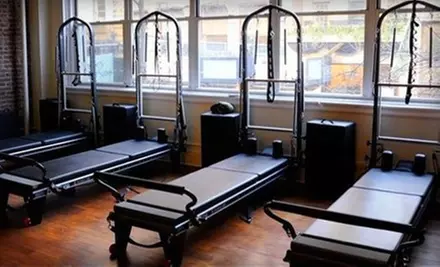 Three Small-Group Classes or One Private Session with a Gyrotonic Session at Gramercy Pilates Fitness (Up to 54% Off) - Primary Image