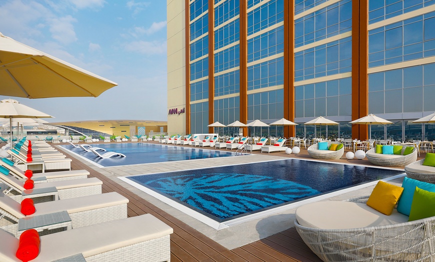 Image 1: Unleash Your Inner Foodie: Indulge in a Breakfast Buffet & Pool Combo!