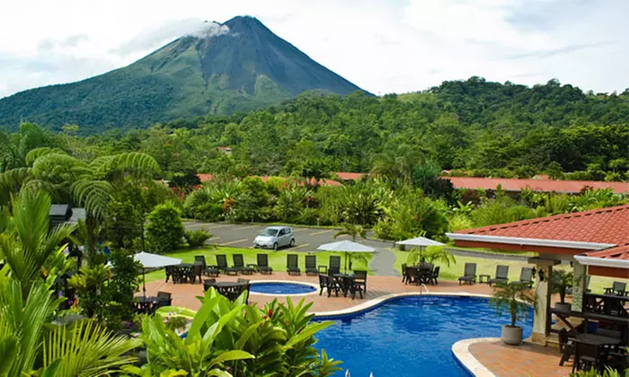 ✈ 7-Night Deluxe Costa Rica Vacation w/ Air & Car. Price/Person, Based on Two Guests/Room. Buy One Voucher/Person. - Primary Image