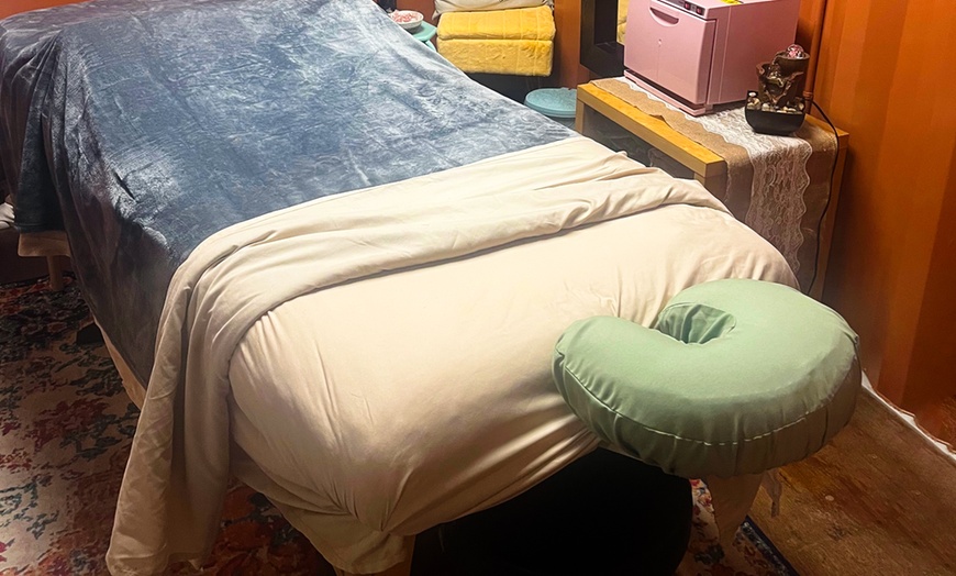 Image 1: Get Deep Tissue + Hot Stone or Prenatal Massage/ Full-Body Sugar Scrub