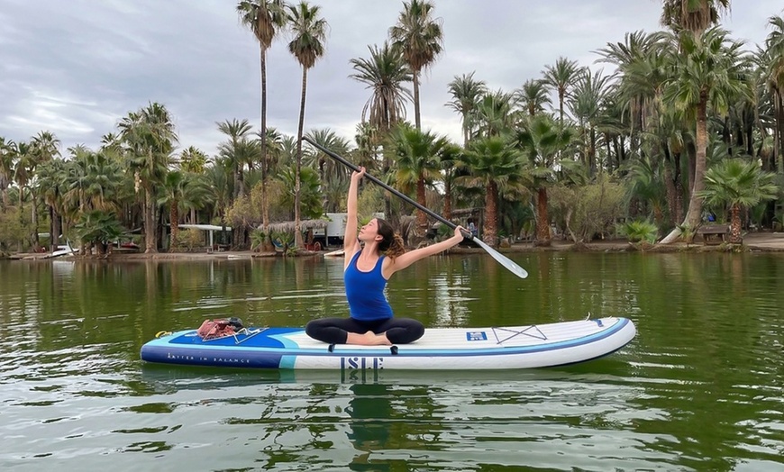 Image 2: Paddleboard Yoga & Fitness Classes with Morning or Sunset Sessions