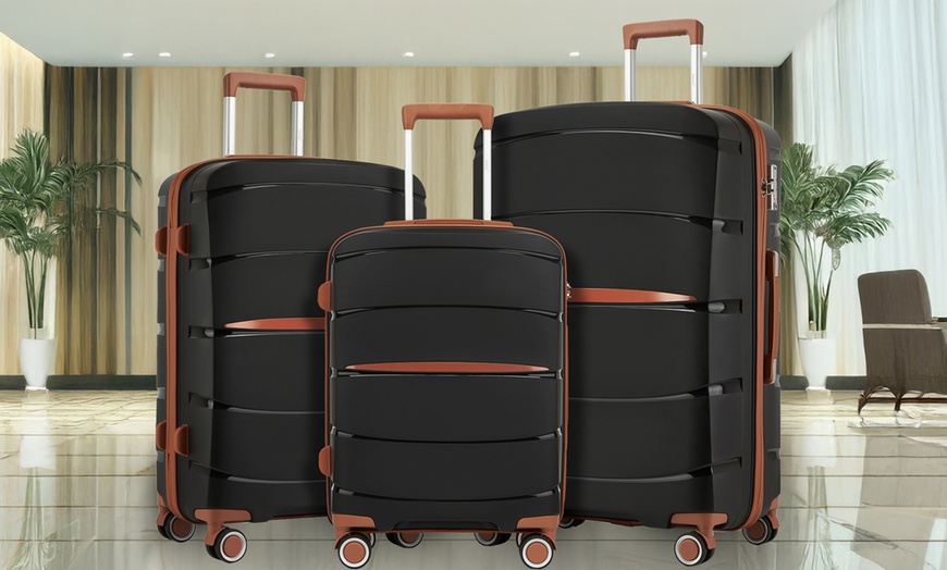 Image 1: Valise rigide résistante aux chocs et aux rayures