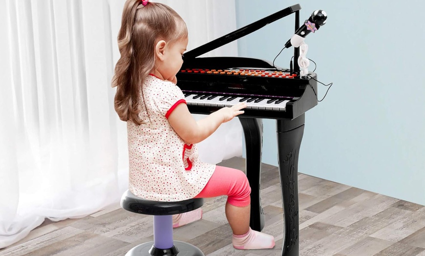 Image 1: HomCom Kids' Mini Electronic Keyboard selection
