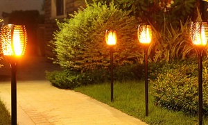 Up to Eight Solar-Powered LED Flickering Flame Torch Lights