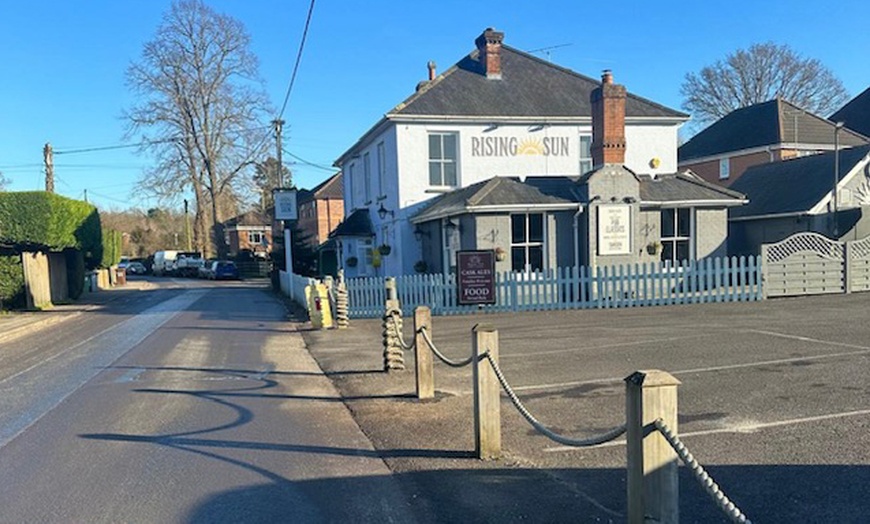 Image 4: Pizzas and Sides for Two or Four at The Rising Sun