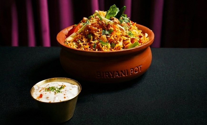 Image 11: Authentic Indian Dining in Winter Park with Entrees, Naan & Drinks