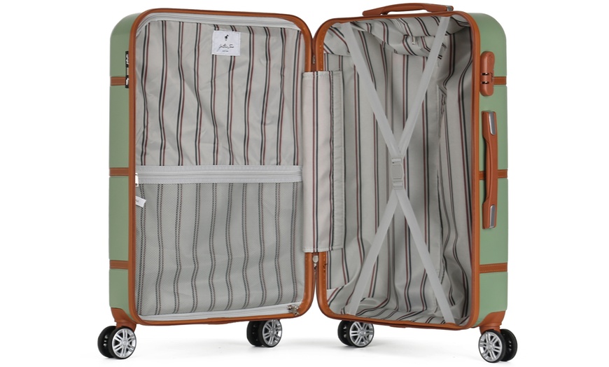 Image 19: Four Trolley Suitcases Set