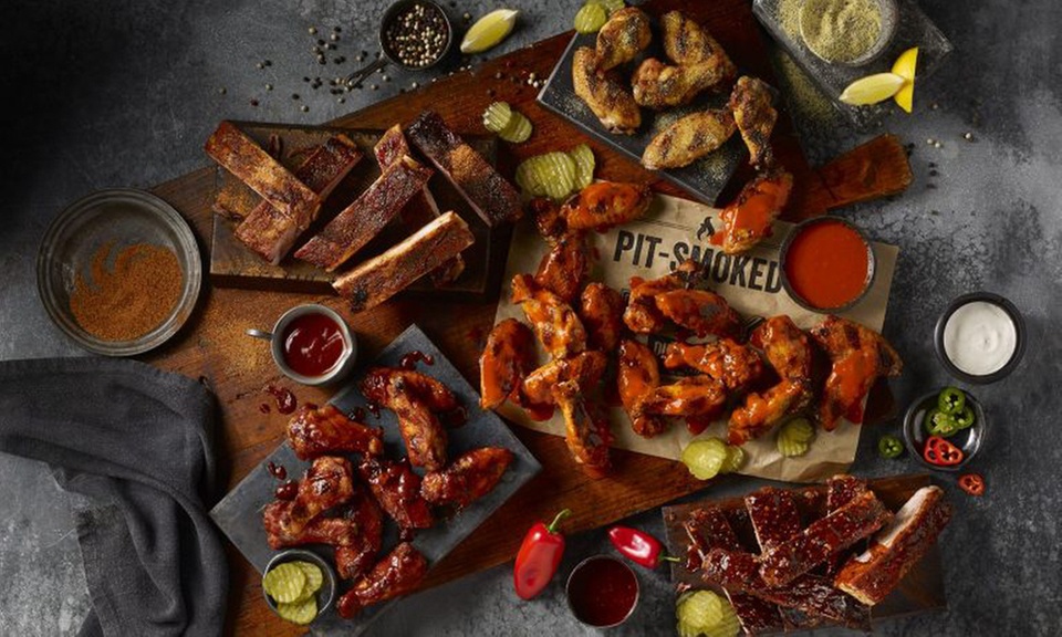 Wings Family Pack or XL Wings and Ribs Pack: Hearty BBQ Meals