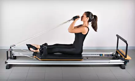 5 or 10 Pilates-Reformer Classes at Core Solutions Pilates & Wellness Studio in Irvine (Up to 82% Off) - Primary Image