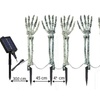 Image 7: Five-Pack Halloween Solar Skull Hand Ground Lights