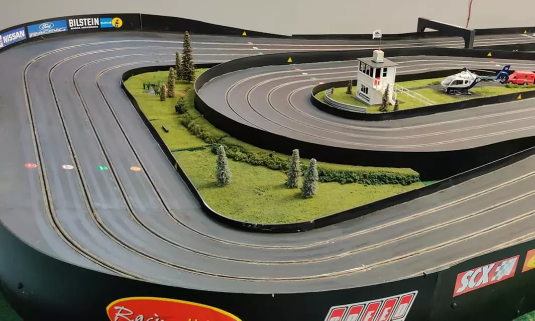 Saturday slot car racing fun with custom lanes and car swaps