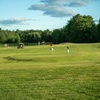 Image 1: Enjoy an 18-Hole Golf Course with Cart Rental and Food Credit