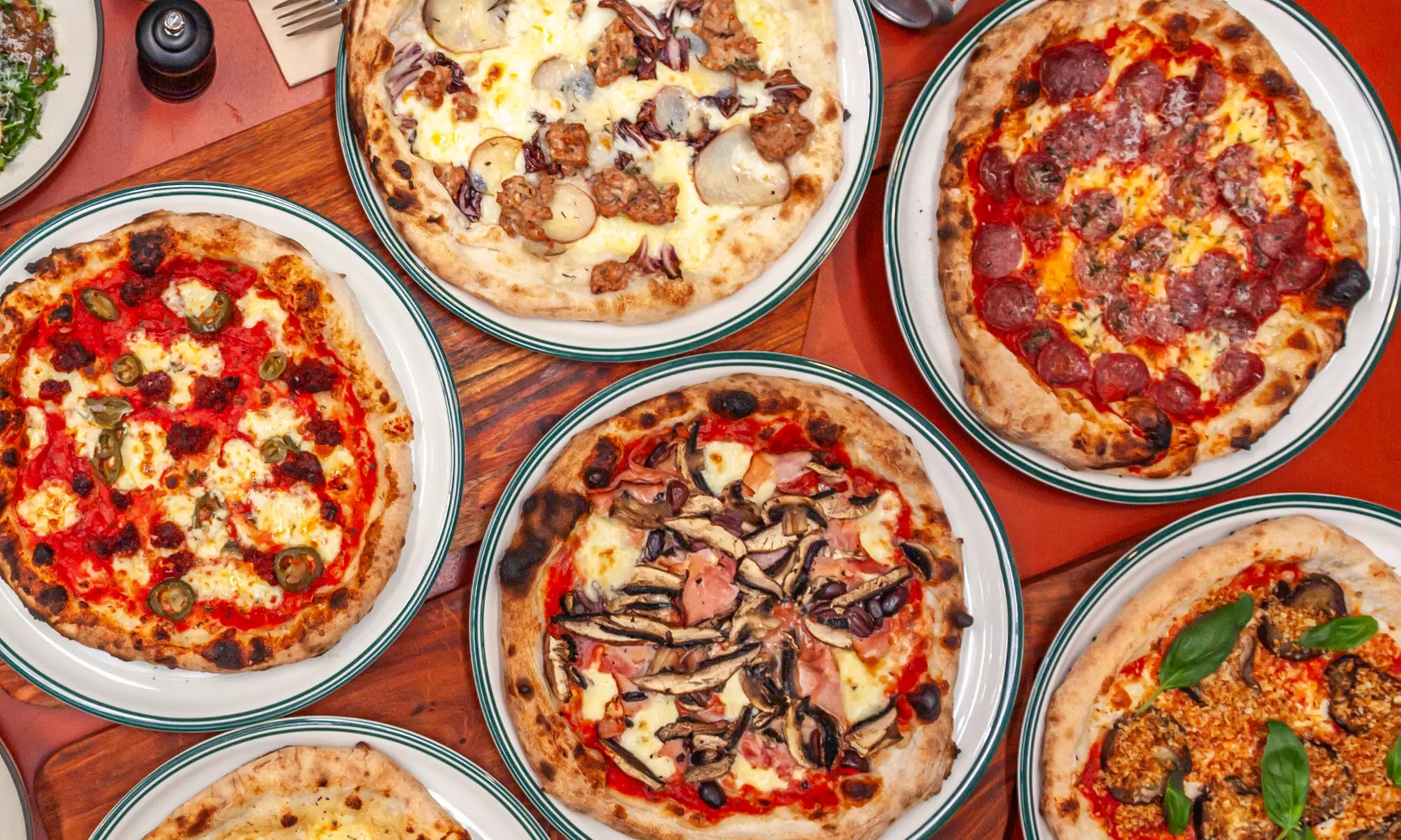 Enjoy a pizza and pint with sides for Two or Four at Local Brewing Co
